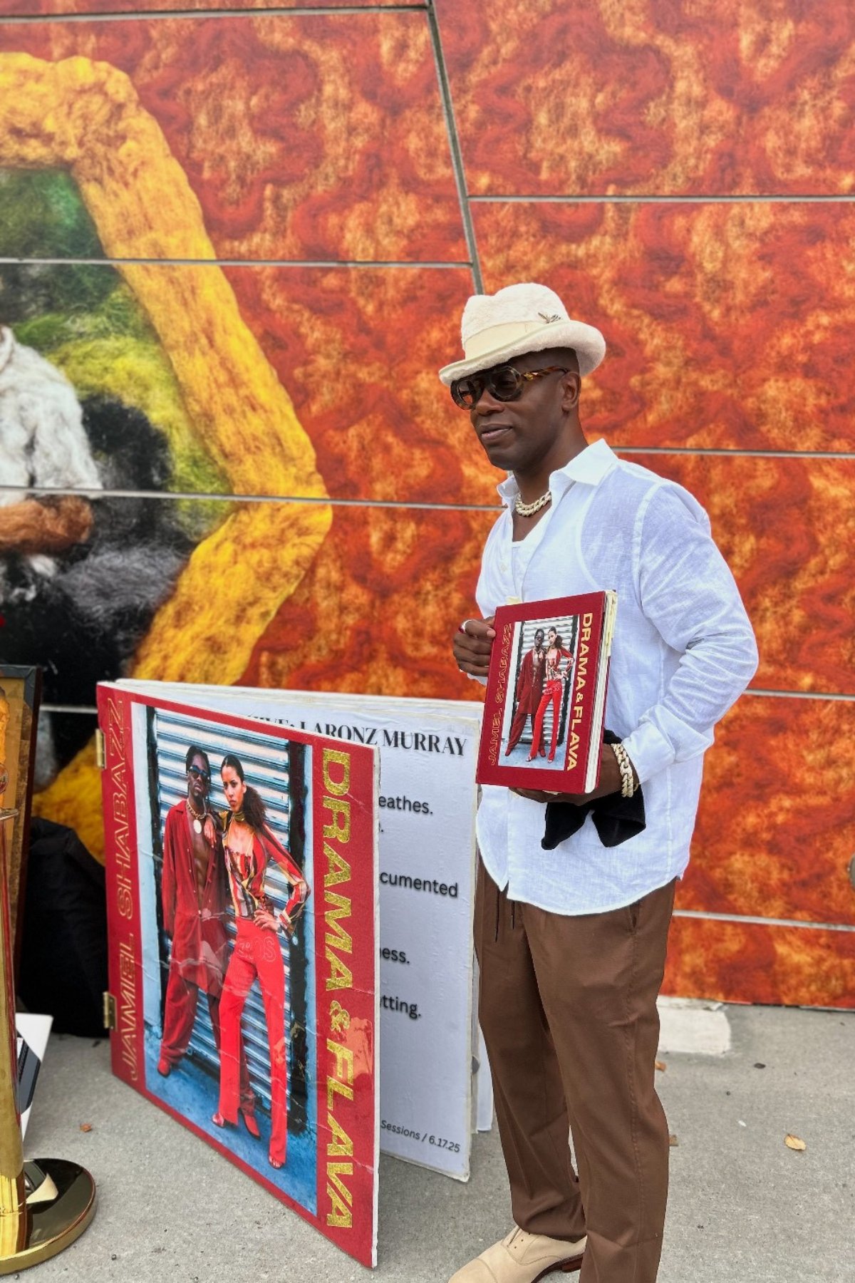 LaRonz Murray holding Drama & Flava (alternate)
